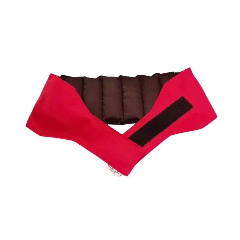 Red waist wheat bag opened flat with velcro strap, designed for lower back and period pain relief