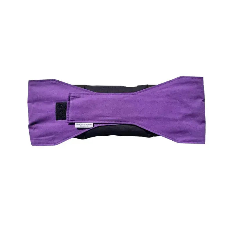 Purple waist wheat bag with velcro strap fastened, designed for lower back and period pain relief