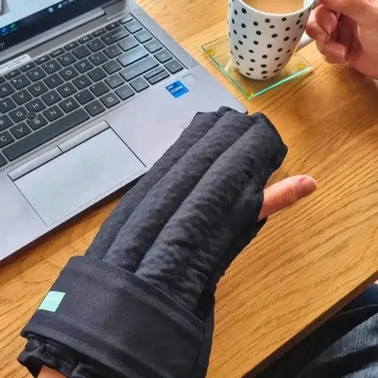 Glove wheat bag to soothe cold, aching hands